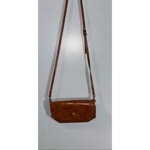 Anthropologie brown fold over snap crossbody fits iPhone 15 pro max